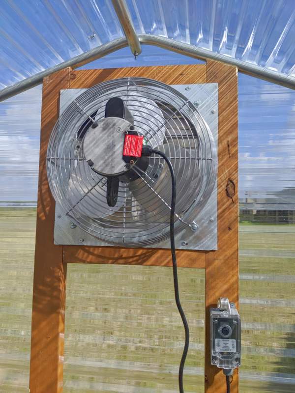 Fan shutter and thermostat for greenhouse